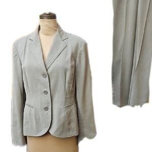 Kim Rogers?  Guess She Makes Pantsuits?  Jacket Size 14, Pants 16.   Hmmm